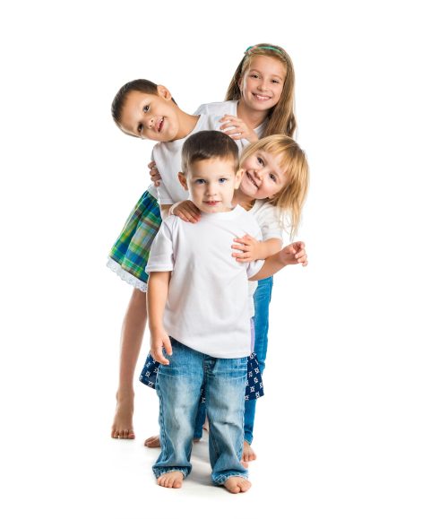 smiling children with arms up
